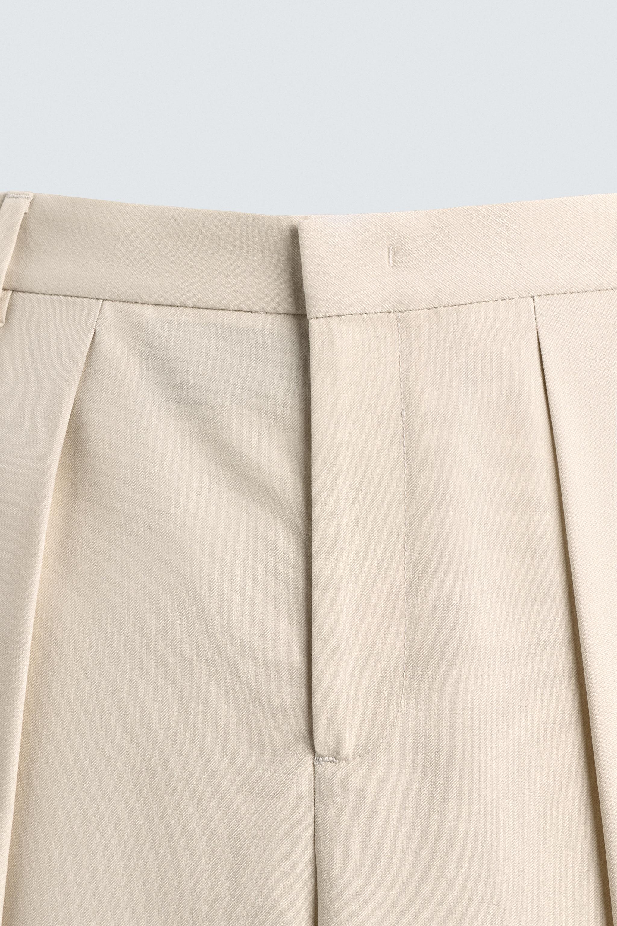 PLEATED WIDE FIT PANTS